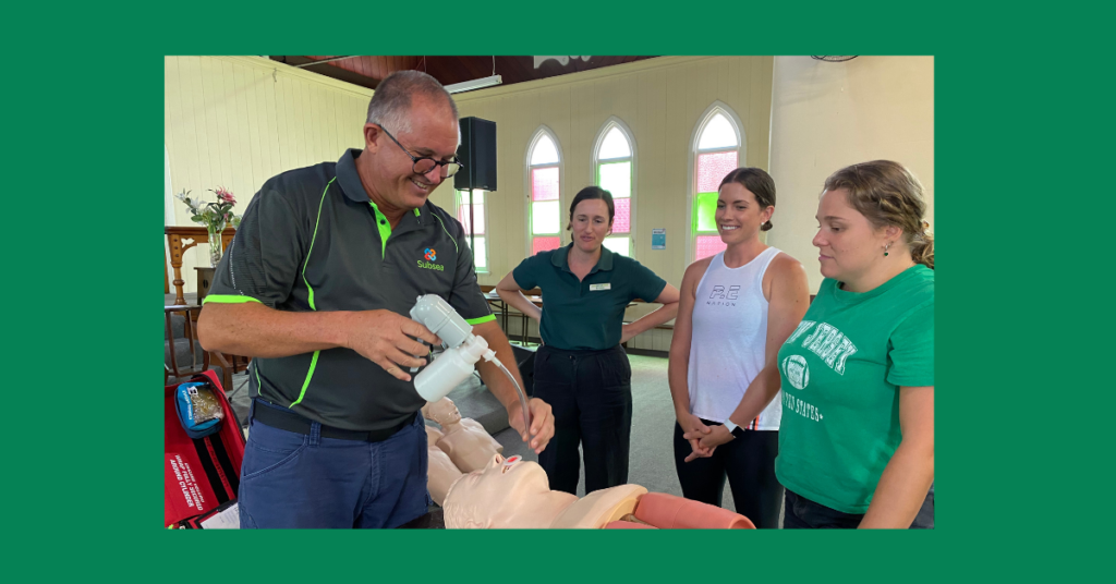 a first aider shows updated first aid techniques