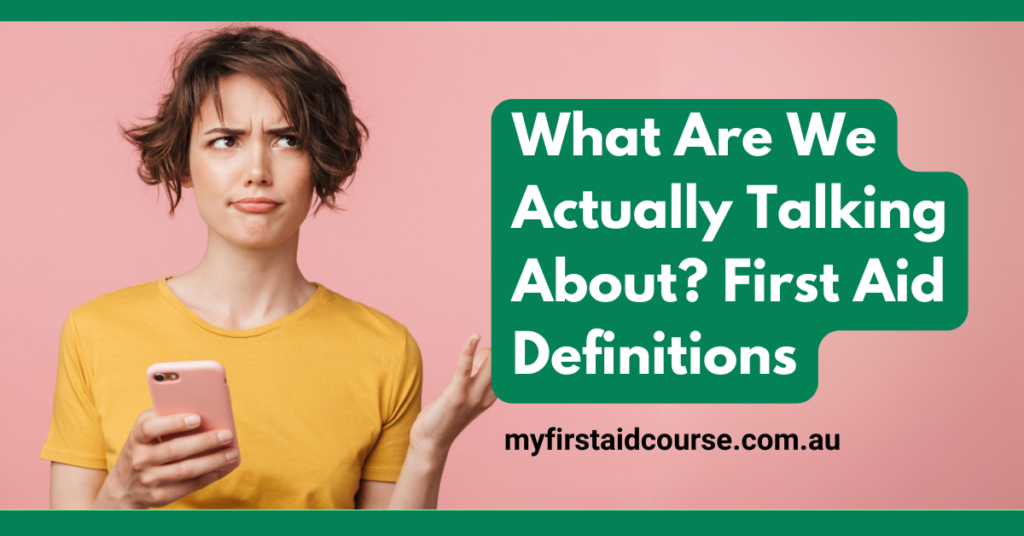 A young woman with short brown hair, wearing a yellow shirt, holds a phone and looks puzzled. The text next to her reads: "What Are We Actually Talking About? First Aid Definitions" with the website "myfirstaidcourse.com.au" below. The background is a soft pink.