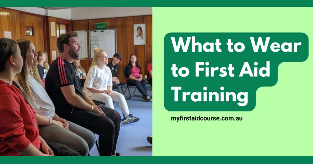 The image shows a group of people seated in a classroom setting, likely attending a first aid training session. The individuals are casually dressed, suggesting a comfortable and relaxed environment. The background includes some posters and charts on the walls, contributing to the educational setting. On the right side of the image, there is a text box with the message "What to Wear to First Aid Training" and the website "myfirstaidcourse.com.au," providing guidance on appropriate attire for such sessions. The overall design is clean and informative, aimed at preparing attendees for their first aid training.